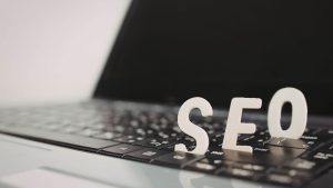 Laptop showing SEO text